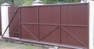 Купить откатные ворота из профнастила Карасук, цена от 1758 руб.